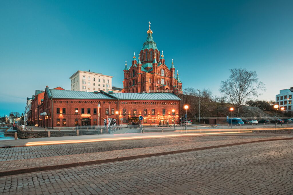 Helsinki, Finland. Uspenski Cathedral In Evening Illuminations Lights. Eastern Orthodox Cathedral